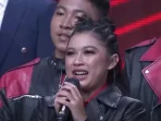 Yohana, Vokalis grup musik asal Surabaya, Jawa Timur, Nine Fighters